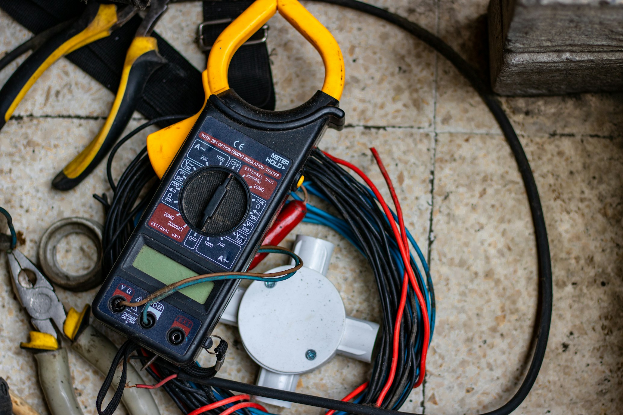Electrician working on an electrical panel