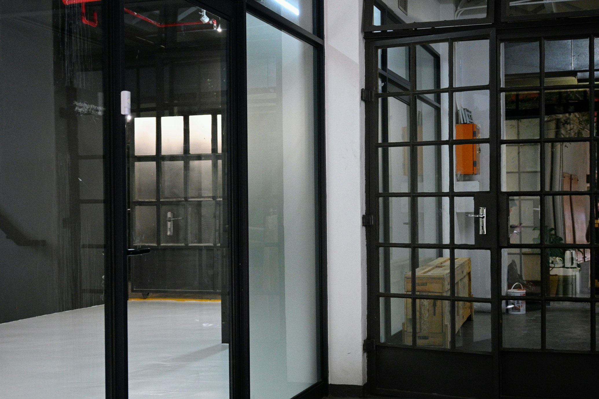 Meeting room enclosed with frosted glass partitions