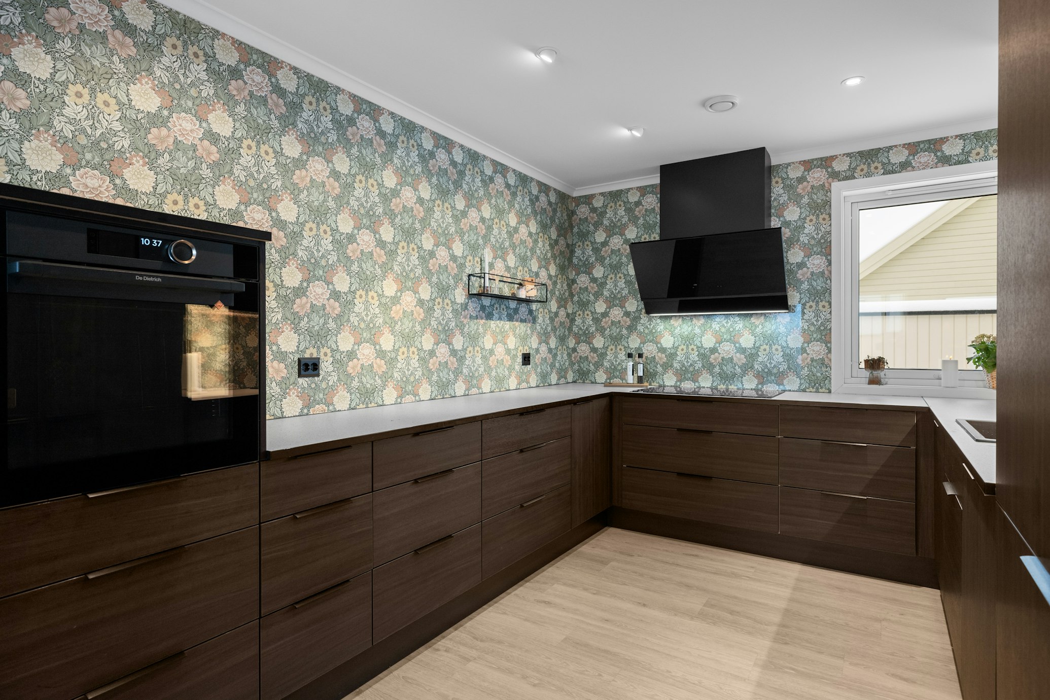 Spacious office pantry with seating area